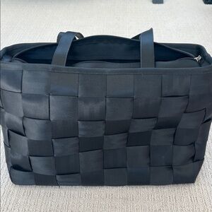 Harvey’s Seatbelt Bag- briefcase style. Two handles. Black Excellent condition.